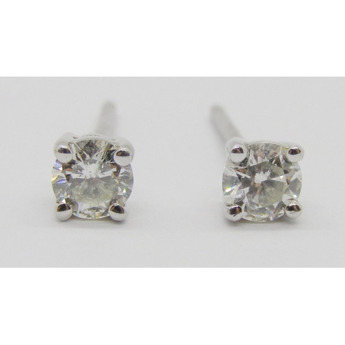 1359 - Pair of 950 platinum diamond stud earrings, 0.15ct each approx, maker 'UT', 1.1g