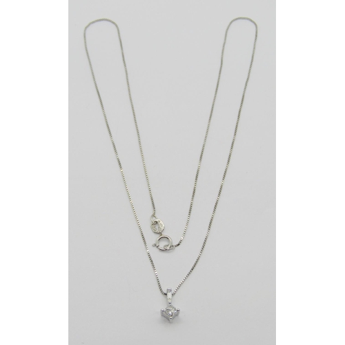 1360 - 950 platinum diamond pendant necklace, the pendant set with a princess-cut and a baguette-cut diamon... 