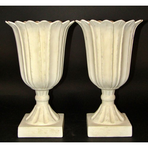 1073 - A classical marbled statue in resin and two flared vases