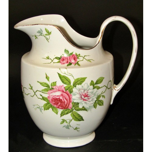 1082 - Salt glazed cup with scrolled handle and a further studio ware tazza, Edwardian ewer with floral det... 