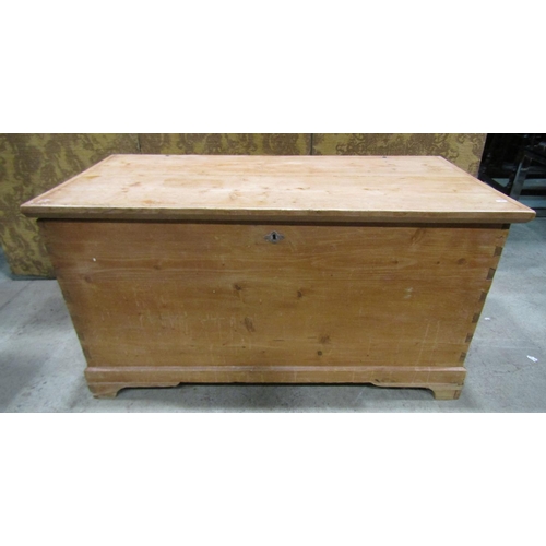 2205 - 19th century stripped pine coffer with hinged lid, drop side carrying handles and exposed dovetail c... 