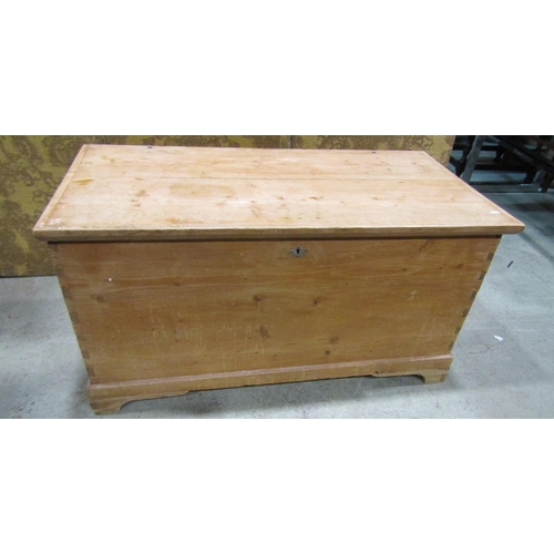 2205 - 19th century stripped pine coffer with hinged lid, drop side carrying handles and exposed dovetail c... 