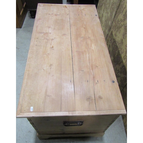 2205 - 19th century stripped pine coffer with hinged lid, drop side carrying handles and exposed dovetail c... 