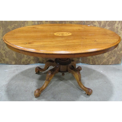 2208 - Victorian oval walnut breakfast table with inlaid detail, raised on a central turned pillar and scro... 