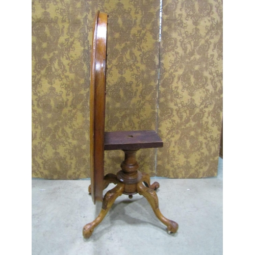 2208 - Victorian oval walnut breakfast table with inlaid detail, raised on a central turned pillar and scro... 