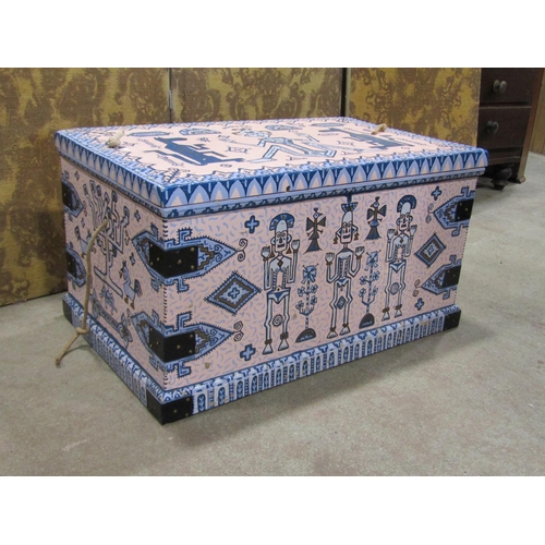 2210 - A decorative over-painted blanket box, decorated with Aztec type figural motifs, 88 x 52cm, 47cm hig... 