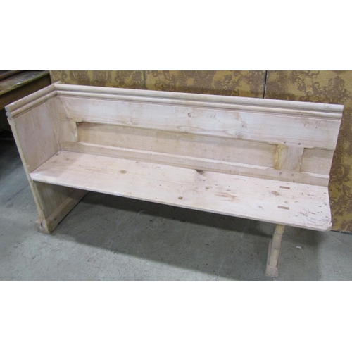 2212 - A stripped pine church pew, with moulded and chamfered frame and single shaped end, 62cm long