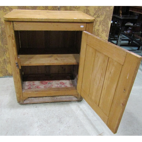 2225 - A rustic stripped pine side cupboard enclosed  by a chamfered tongue and groove panelled door within... 