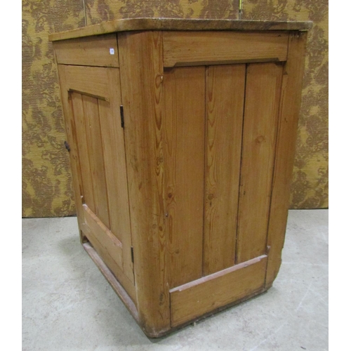 2225 - A rustic stripped pine side cupboard enclosed  by a chamfered tongue and groove panelled door within... 