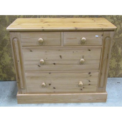 2229 - A good quality stripped pine bedroom chest of two long and two short drawers set on a moulded plinth... 