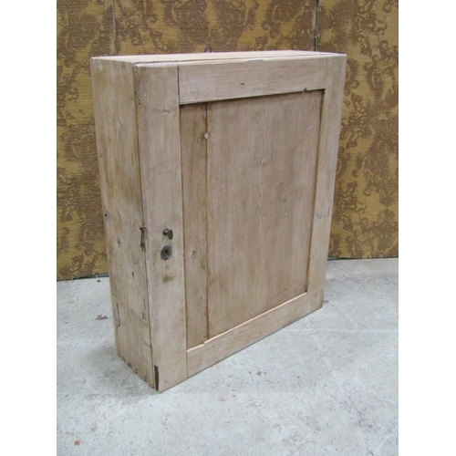 2230 - Old stripped pine hanging cupboard with rectangular panelled door enclosing a painted fixed shelf to... 