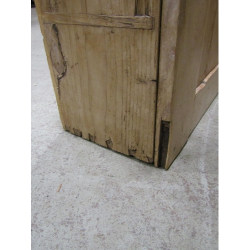 2230 - Old stripped pine hanging cupboard with rectangular panelled door enclosing a painted fixed shelf to... 