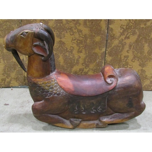 2235 - A novelty carved hardwood rocking goat with polychrome decoration