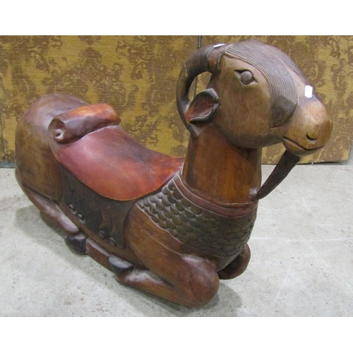 2235 - A novelty carved hardwood rocking goat with polychrome decoration