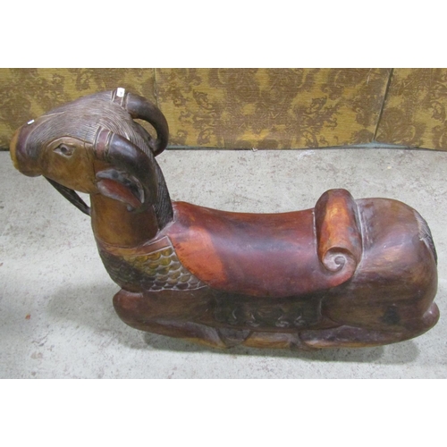 2235 - A novelty carved hardwood rocking goat with polychrome decoration