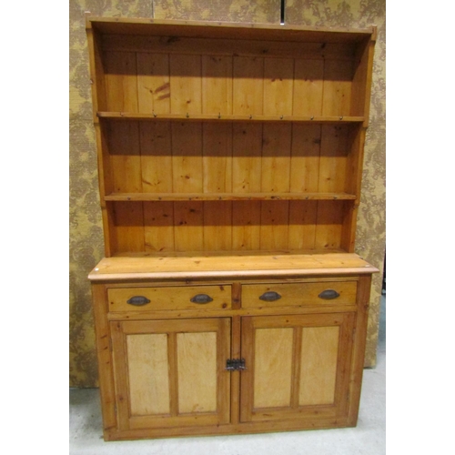 2236 - Rustic stripped pine kitchen dresser, the base enclosed by a pair of twin panelled doors beneath two... 