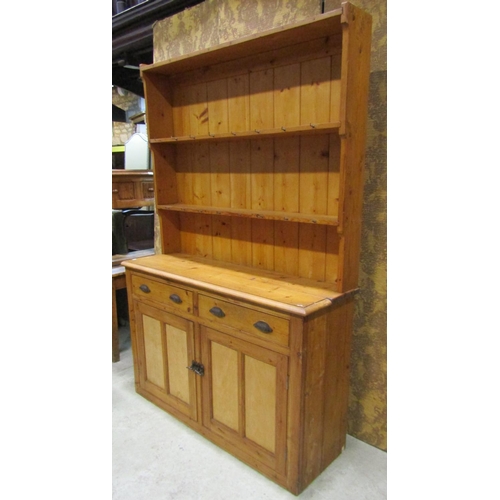 2236 - Rustic stripped pine kitchen dresser, the base enclosed by a pair of twin panelled doors beneath two... 