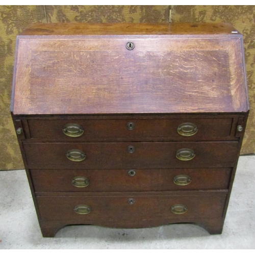 2239 - Georgian oak bureau the fall flap enclosing a partially fitted interior with mahogany fronted drawer... 