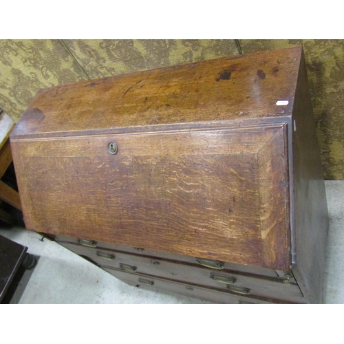 2239 - Georgian oak bureau the fall flap enclosing a partially fitted interior with mahogany fronted drawer... 