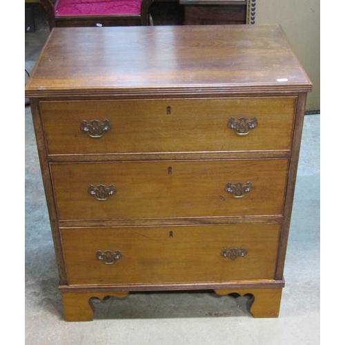 2241 - A small Georgian style mahogany chest of three long graduated drawers set on bracket feet, 68cm wide... 