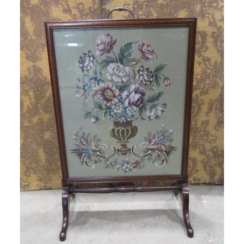 2247 - A late 19th century mahogany framed firescreen with hand worked tapestry panel raised on shaped supp... 