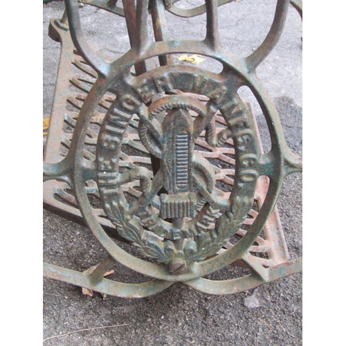 2052 - Vintage cast iron Singer sewing machine base, later adapted as a garden table or wash stand with rem... 