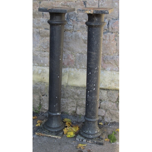 2099 - Pair of Victorian cast iron columns with square fixing plates, approx 1m high