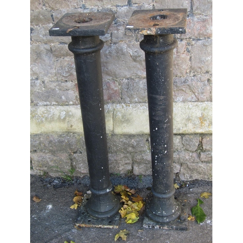 2099 - Pair of Victorian cast iron columns with square fixing plates, approx 1m high