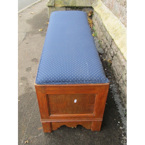 2156 - A large Low rectangular oak stool with upholstered seat over two drawers, 123cm long x 41cm wide x 5... 