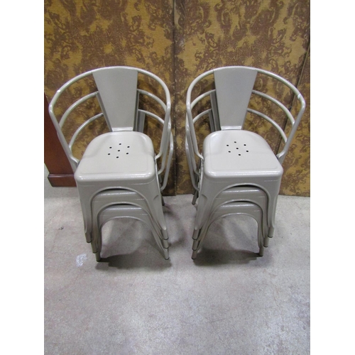 2169 - A set of six vintage style sage green painted tubular stacking aluminium chairs with pierced seats