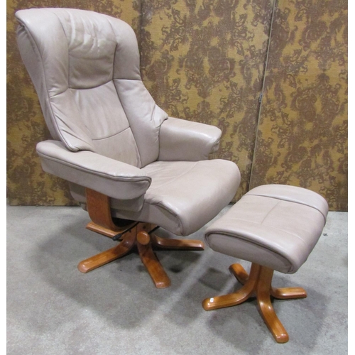 2194 - A pair of Stressless style swivel adjustable lounge chairs with cream coloured soft leather upholste... 