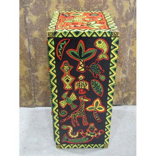 2215 - A small wooden painted four drawer chest with all over brightly painted decoration, 40cm wide x 33cm... 