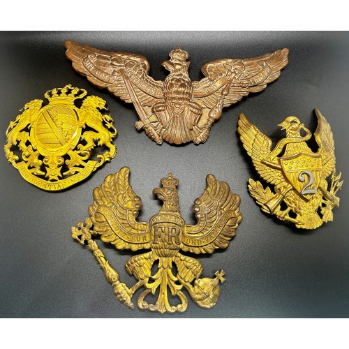 1815 - Three Imperial German / Prussian helmet plates / badges together with an American US Army 2nd Infant... 