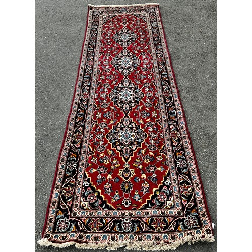 2717 - Central Persian Kashan runner with a  row of four interlocking medallions on a floral ground, 2.90m ... 