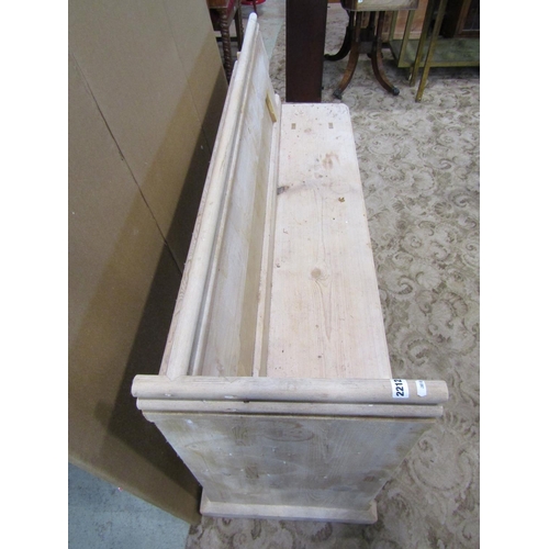 2212 - A stripped pine church pew, with moulded and chamfered frame and single shaped end, 62cm long