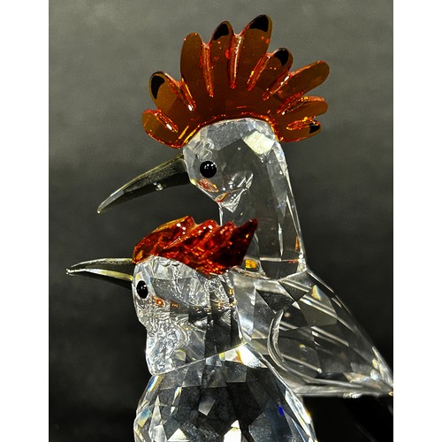 1114 - A pair of Swarovski crystal tropic bird figures, to include a toucan and hoopoes