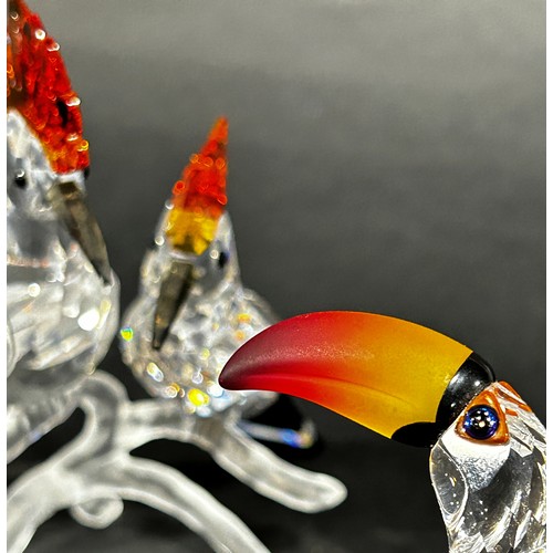 1114 - A pair of Swarovski crystal tropic bird figures, to include a toucan and hoopoes