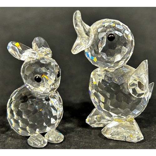 1119 - A group of miniature Swarovski crystal figures formed as a chick, owl, lady bird and rabbit