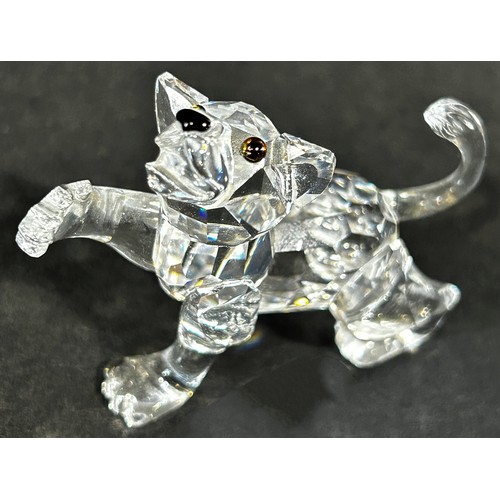 1121 - Two miniature Swarovski Crystal figures, a fox and lion cub.