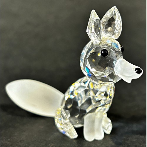 1121 - Two miniature Swarovski Crystal figures, a fox and lion cub.