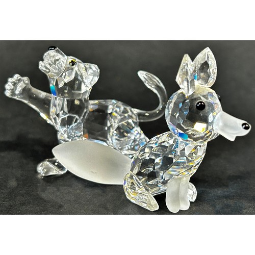 1121 - Two miniature Swarovski Crystal figures, a fox and lion cub.