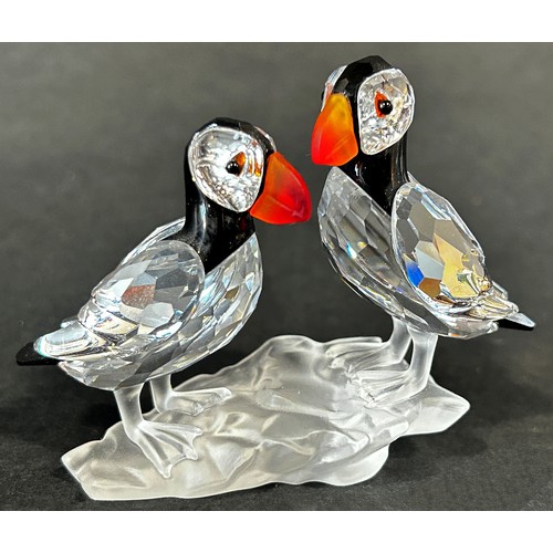 1122 - A lot of Swarovski crystal British birds to include a puffin, doves and kingfishers