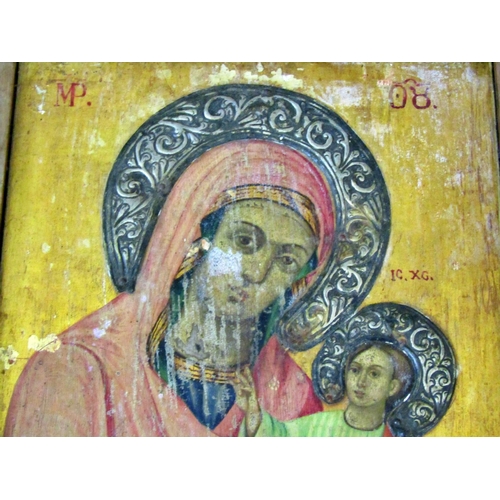 75 - 19th Century Russian icon of Madonna and Child, tempera and gilding on panel with white metal repous... 