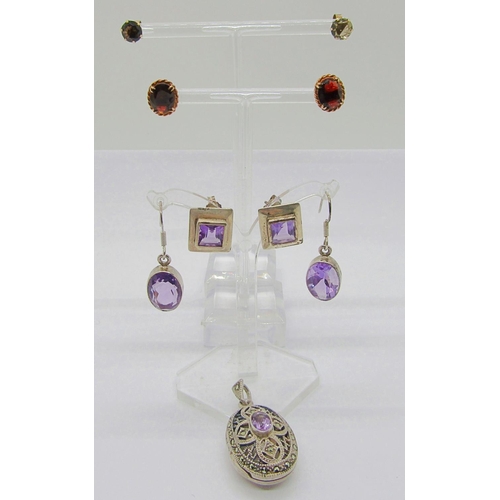 1364 - Two pairs of 9ct gem set stud earrings; a garnet and a citrine pair, together with a group of silver... 