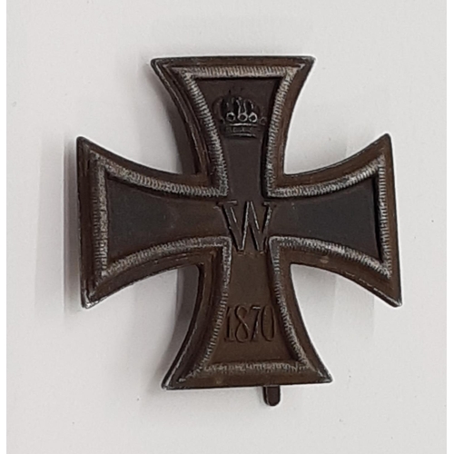 1799 - A Prussian 1870 iron cross tunic badge, stamped verso ‘FELDSPITAL’, 1870