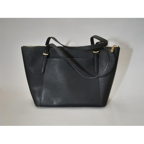 430 - Michael Kors  top zip Tote bag in black leather; interior has zipped compartment and 2 open pockets.... 