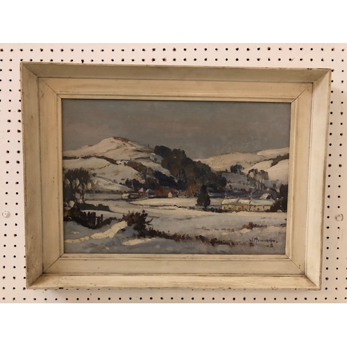 99 - Joseph Edward Hennah (1896-1963) - Winter landscape with town in the valley (1963), signed and dated... 