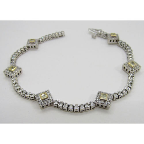 1367 - A demi-parure of 18ct white gold, white and yellow diamond jewellery, comprising bracelet and pair o... 