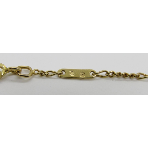 1373 - Carrera y Carrera, Madrid. A Spanish gold pendant necklace, in the form of a hand holding a single c... 