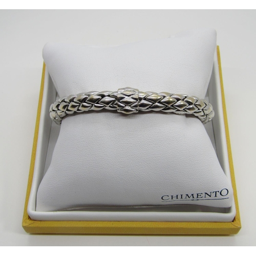 1379 - Chimento. An 18ct white gold ‘stretch’ bracelet, marked Chimento, 750, 21cm long, 34g (boxed).